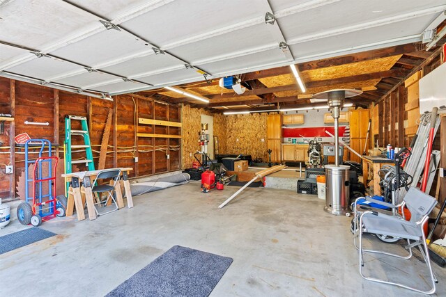 3218 E 24th Ave, Spokane, WA 99223 - garage featuring a garage door opener