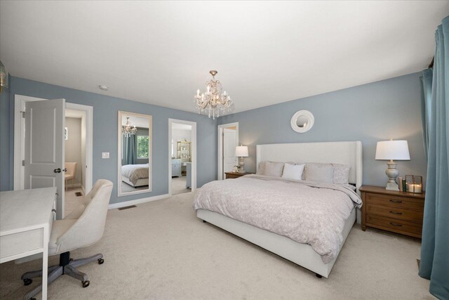 4620 E 43rd Ave, Spokane, WA 99223 - bedroom with a chandelier, light colored carpet, and an office area