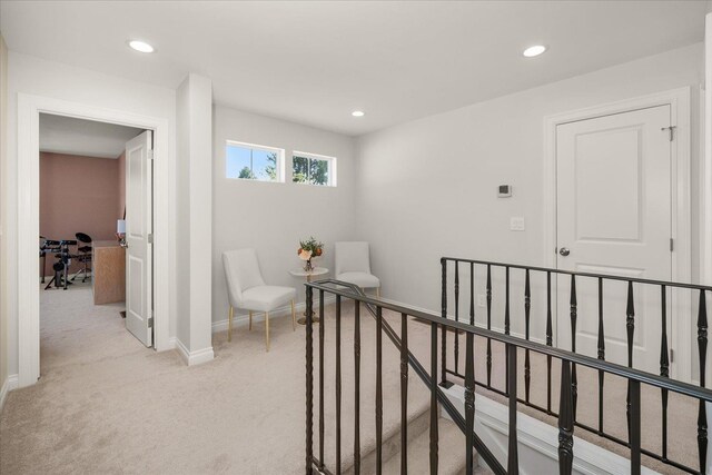 4620 E 43rd Ave, Spokane, WA 99223 - hallway with light colored carpet, an upstairs landing, and recessed lighting
