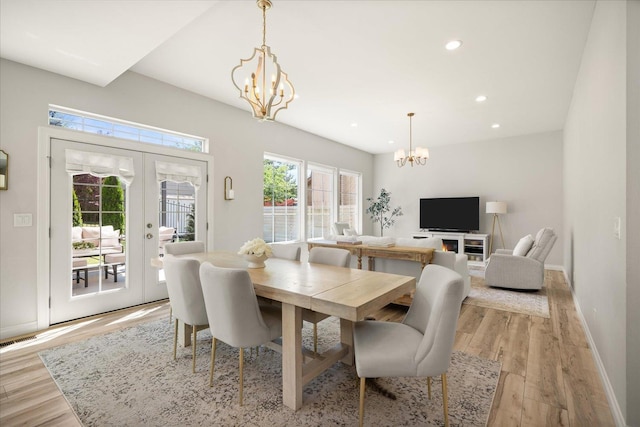 4620 E 43rd Ave, Spokane, WA 99223 - dining room with a chandelier, light wood-type flooring, recessed lighting, and french doors