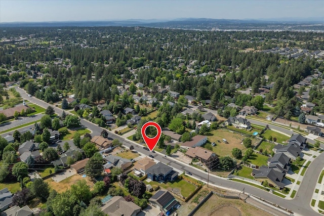 4620 E 43rd Ave, Spokane, WA 99223 - view of property location with a heavily wooded area and nearby suburban area