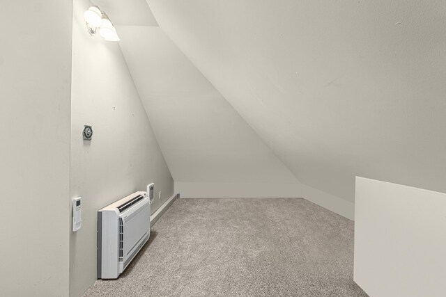 4217 E 22nd Ave, Spokane, WA 99223 - bonus room with vaulted ceiling, light colored carpet, and heating unit