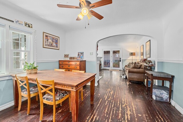 4217 E 22nd Ave, Spokane, WA 99223 - dining area featuring arched walkways, wood finished floors, and ceiling fan