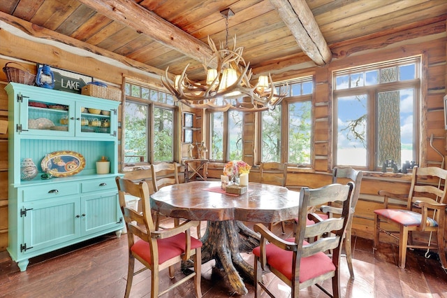 4629 Mix Way, Loon Lake, WA 99148 - dining space featuring a wooden ceiling with exposed beams, dark wood-style flooring, and a chandelier