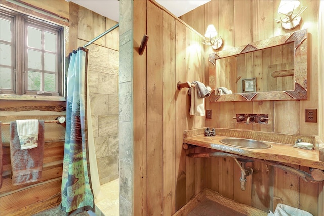 4629 Mix Way, Loon Lake, WA 99148 - full bathroom with a tile shower, vanity, and wooden walls