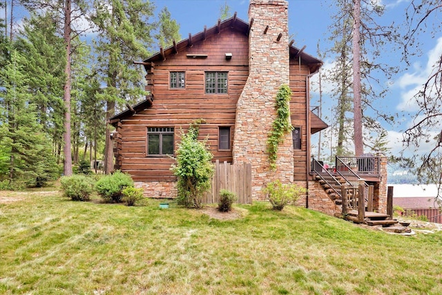 4629 Mix Way, Loon Lake, WA 99148 - view of side of home featuring stairway, a chimney, a deck, and log siding