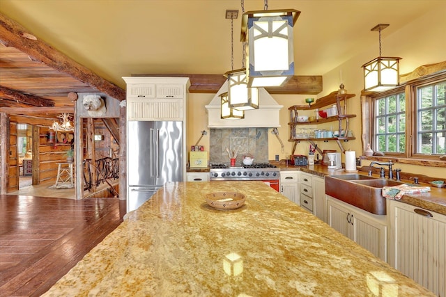 4629 Mix Way, Loon Lake, WA 99148 - kitchen featuring high end appliances, hardwood / wood-style flooring, beamed ceiling, pendant lighting, and open shelves