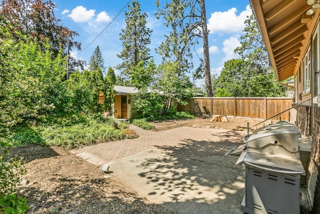 1107 W 19th Ave, Spokane, WA 99203 - fenced backyard with a patio