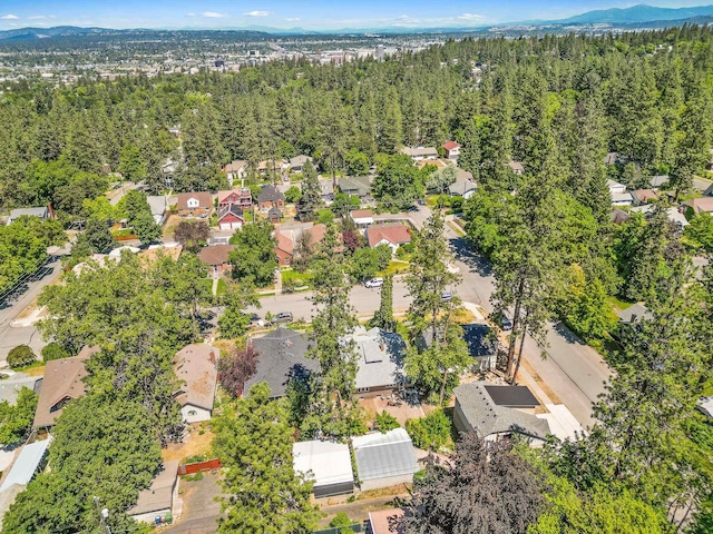 1107 W 19th Ave, Spokane, WA 99203 - aerial view of residential area featuring a forest and mountains