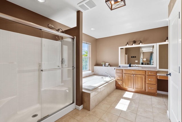 5857 Little Sandy Loop Rd, Nine Mile Falls, WA 99026 - bathroom featuring a shower stall, vanity, a garden tub, and tile patterned floors