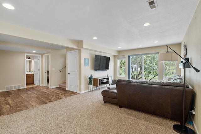 5857 Little Sandy Loop Rd, Nine Mile Falls, WA 99026 - living room with stairs, recessed lighting, and light carpet