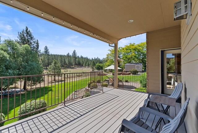 5857 Little Sandy Loop Rd, Nine Mile Falls, WA 99026 - wooden deck featuring a lawn