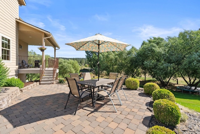 5857 Little Sandy Loop Rd, Nine Mile Falls, WA 99026 - view of patio featuring outdoor dining space and stairway
