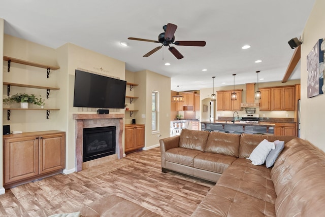5857 Little Sandy Loop Rd, Nine Mile Falls, WA 99026 - living room featuring a ceiling fan, a tile fireplace, and recessed lighting