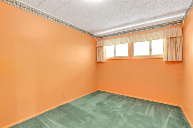 1718 E 39th Ave, Spokane, WA 99203 - spare room with dark carpet