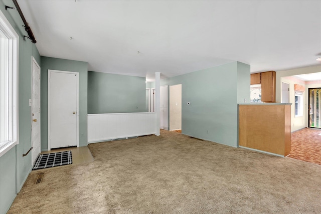 1718 E 39th Ave, Spokane, WA 99203 - carpeted empty room with a wainscoted wall