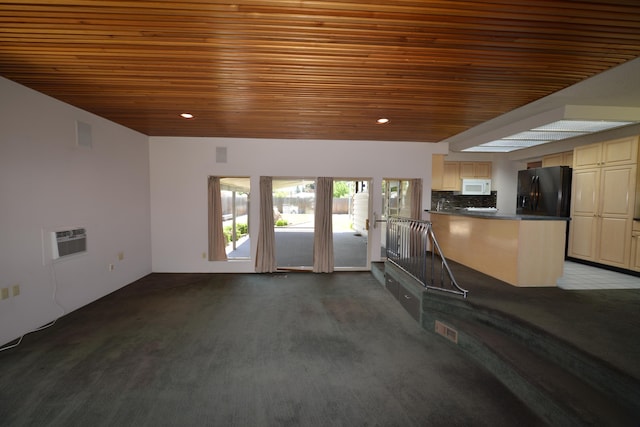 7516 E Baldwin Ave, Spokane Valley, WA 99212 - unfurnished living room featuring wood ceiling, recessed lighting, and carpet