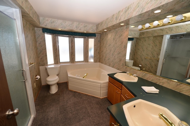 7516 E Baldwin Ave, Spokane Valley, WA 99212 - full bathroom with double vanity, a stall shower, a garden tub, and wallpapered walls