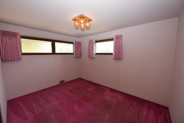7516 E Baldwin Ave, Spokane Valley, WA 99212 - unfurnished room featuring dark colored carpet