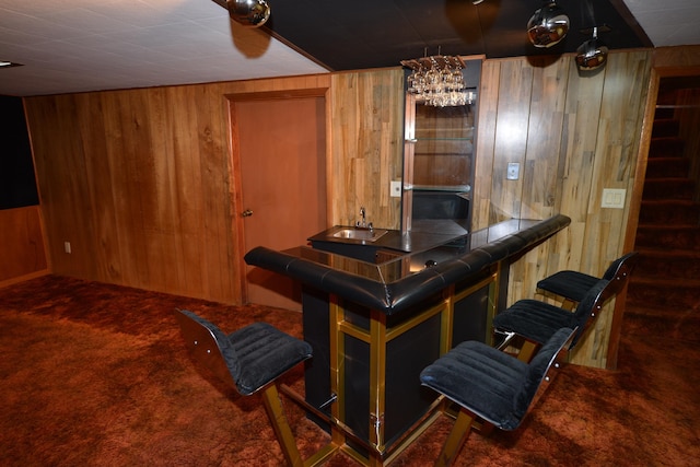 7516 E Baldwin Ave, Spokane Valley, WA 99212 - bar area featuring wood walls, carpet floors, stairs, and a chandelier