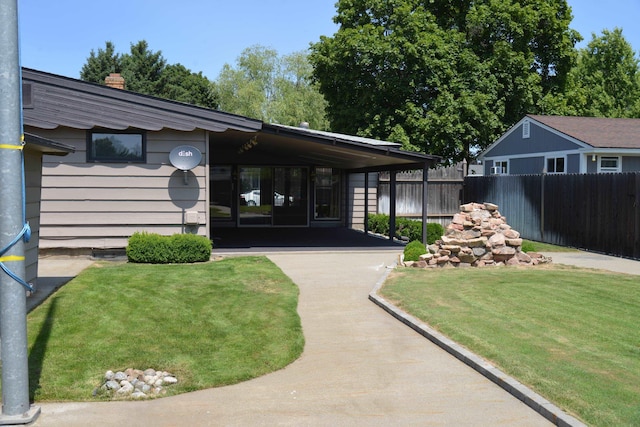 7516 E Baldwin Ave, Spokane Valley, WA 99212 - entrance to property featuring a chimney and a carport