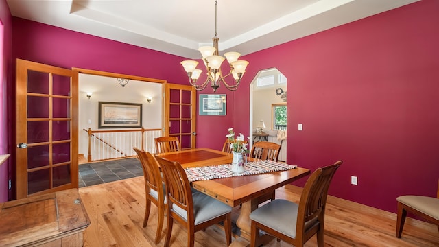 19918 E Pheasant Dr, Greenacres, WA 99016 - dining space featuring a chandelier and wood finished floors