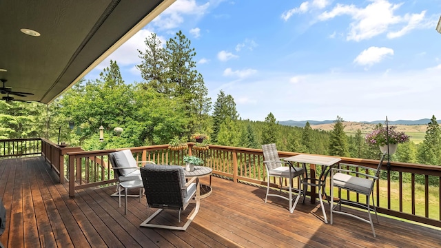 19918 E Pheasant Dr, Greenacres, WA 99016 - deck featuring a mountain view and outdoor dining space