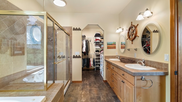 19918 E Pheasant Dr, Greenacres, WA 99016 - full bathroom featuring a whirlpool tub, a shower stall, a spacious closet, and double vanity