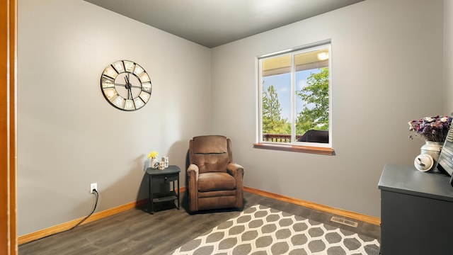19918 E Pheasant Dr, Greenacres, WA 99016 - sitting room with baseboards and wood finished floors
