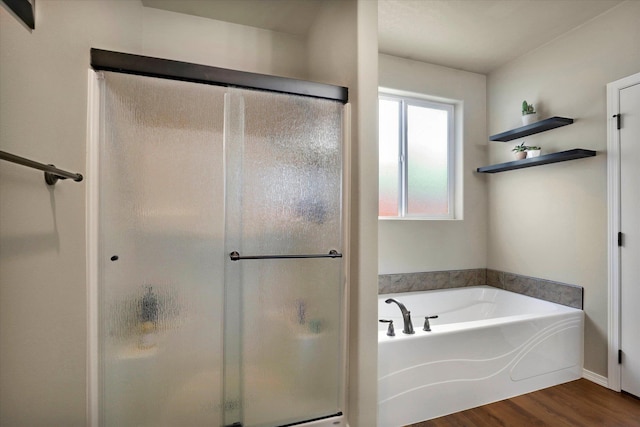 2204 S Lloyd Ct, Spokane, WA 99223 - bathroom with a shower stall, wood finished floors, and a garden tub