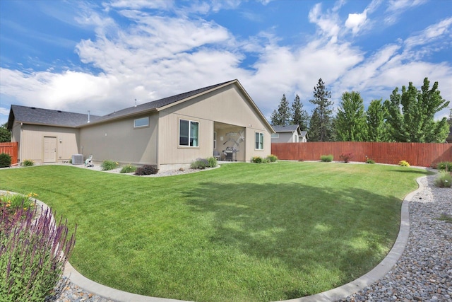 2204 S Lloyd Ct, Spokane, WA 99223 - back of house with a fenced backyard