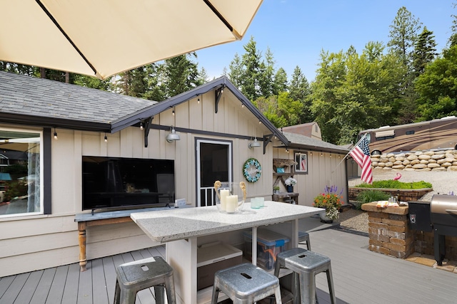 23632 E Beach Ln, Newman Lake, WA 99025 - deck with outdoor dining area and area for grilling
