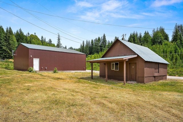 1541 Thompson Rd, Elk, WA 99009 - view of grassy yard featuring a pole building and an outbuilding