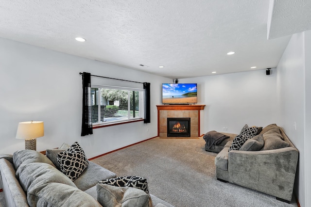 1308 S Drummond Rd, Spokane Valley, WA 99016 - living area with carpet flooring, recessed lighting, a fireplace, and a textured ceiling