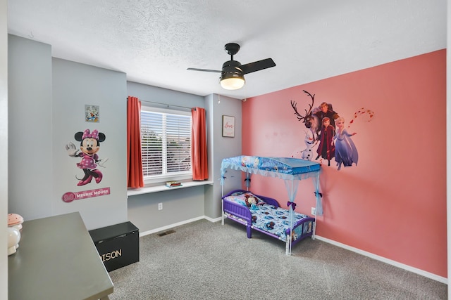 1308 S Drummond Rd, Spokane Valley, WA 99016 - bedroom featuring carpet, a ceiling fan, and a textured ceiling