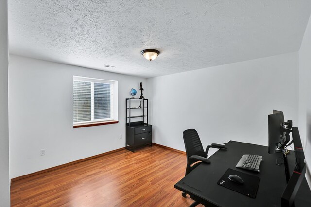 1308 S Drummond Rd, Spokane Valley, WA 99016 - home office featuring wood finished floors and a textured ceiling