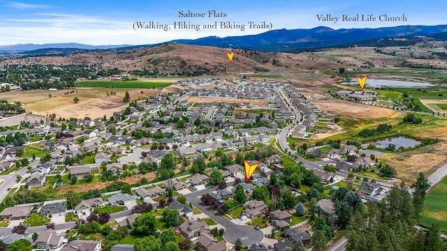1308 S Drummond Rd, Spokane Valley, WA 99016 - aerial overview of property's location featuring a water and mountain view and nearby suburban area
