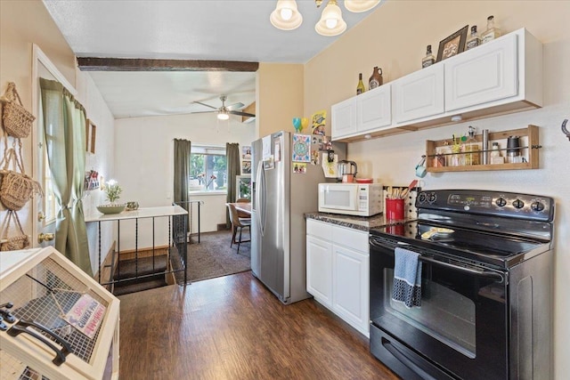 6503 N Calispel St, Spokane, WA 99208 - kitchen featuring black range with electric cooktop, white microwave, freestanding refrigerator, dark wood-style floors, and white cabinetry