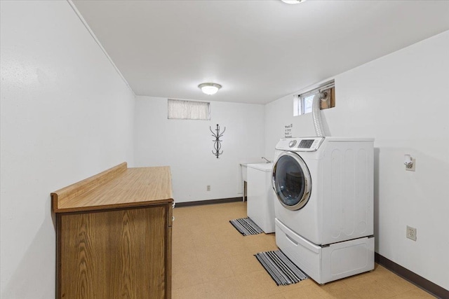 6503 N Calispel St, Spokane, WA 99208 - washroom featuring washer / clothes dryer and light floors