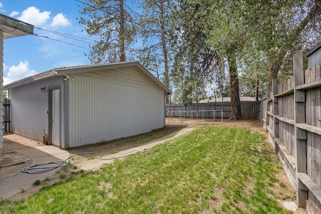 6503 N Calispel St, Spokane, WA 99208 - fenced backyard with an outbuilding