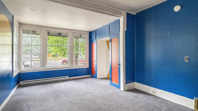 1622 W 10th Ave, Spokane, WA 99204 - carpeted spare room with a baseboard radiator and baseboards
