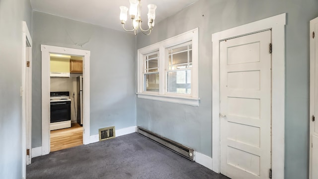 1622 W 10th Ave, Spokane, WA 99204 - unfurnished dining area featuring baseboard heating, a chandelier, and carpet flooring