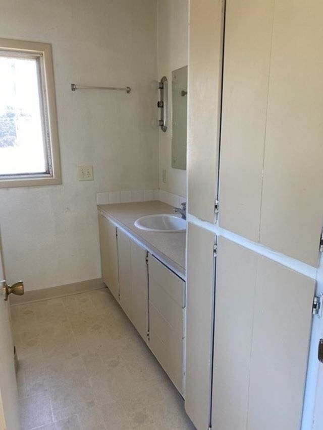 2526 W Sinto Ave, Spokane, WA 99201 - bathroom featuring vanity and tile patterned floors