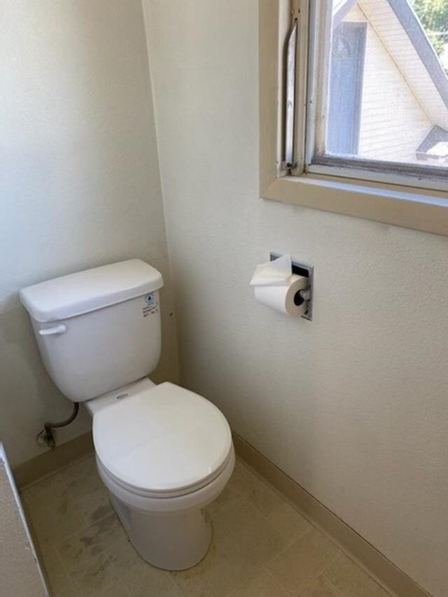 2526 W Sinto Ave, Spokane, WA 99201 - bathroom featuring toilet and baseboards