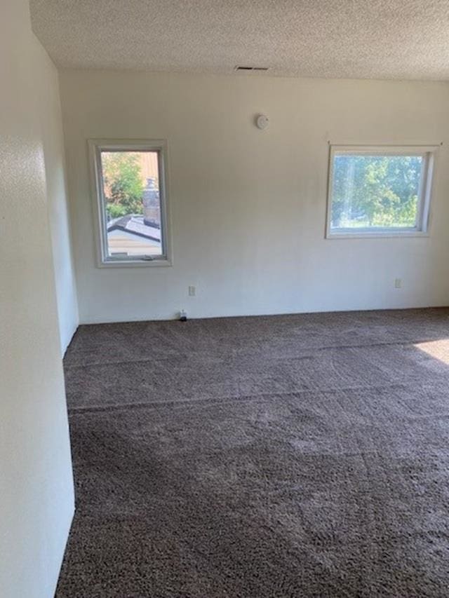2526 W Sinto Ave, Spokane, WA 99201 - carpeted empty room featuring a textured ceiling