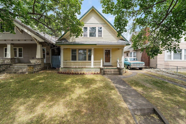 2624 W College Ave, Spokane, WA 99201 - bungalow-style house featuring covered porch and a front yard