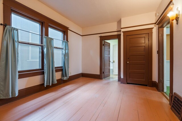 2624 W College Ave, Spokane, WA 99201 - empty room featuring light wood-style flooring and baseboards