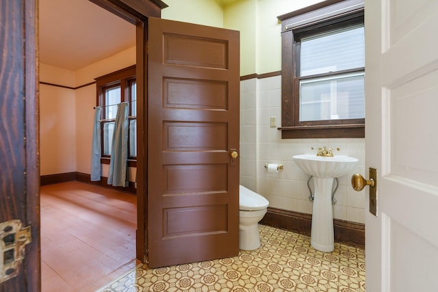 2624 W College Ave, Spokane, WA 99201 - half bathroom with toilet and tile walls