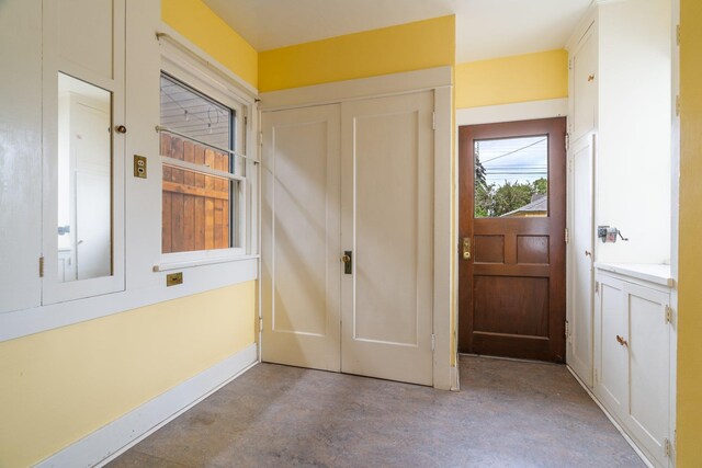 2624 W College Ave, Spokane, WA 99201 - entrance foyer with finished concrete flooring and baseboards