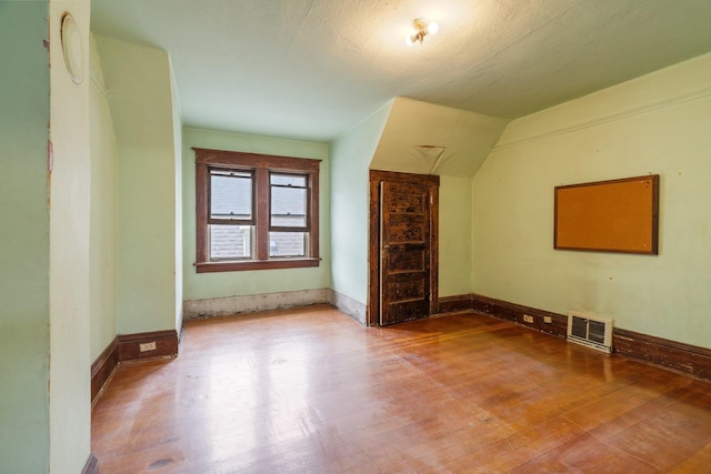 2624 W College Ave, Spokane, WA 99201 - bonus room featuring wood finished floors and lofted ceiling